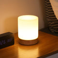 Minimalistic table lamp with touch function and 360° lighting