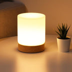 Minimalistic table lamp with touch function and 360° lighting