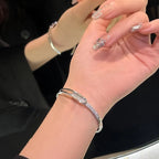 Open bracelet made of 925 sterling silver with zirconia