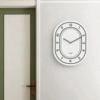 Silent Oval Wall Clock with Roman Numerals Design
