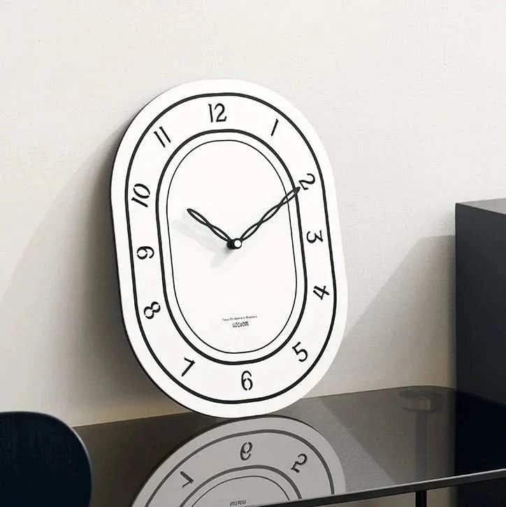 Silent Oval Wall Clock with Roman Numerals Design