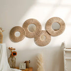 Round decorative wall mirror in boho style with woven hemp rope