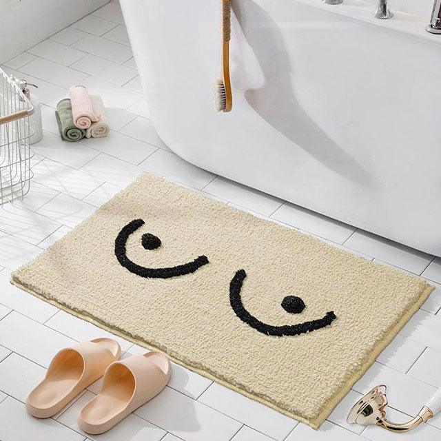 Bath mat with tits
