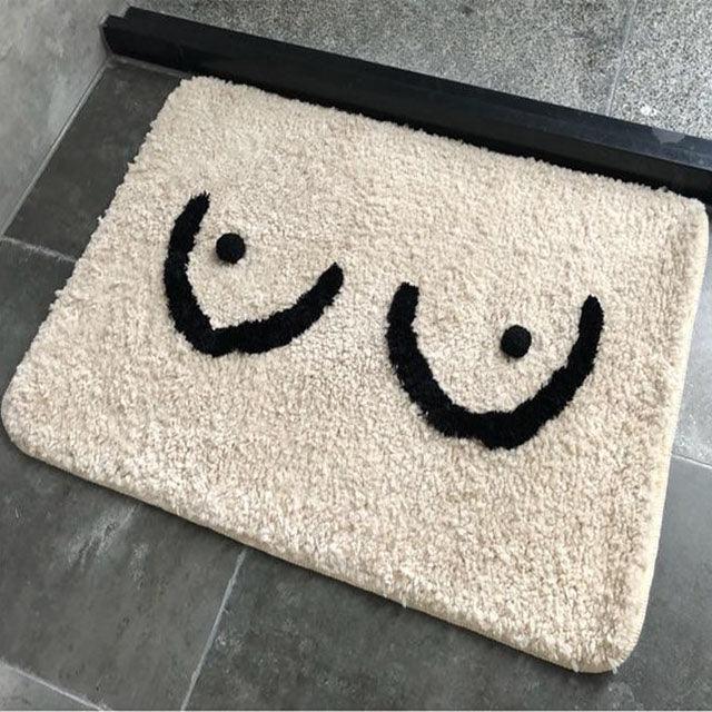 Bath mat with tits