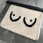 Bath mat with tits
