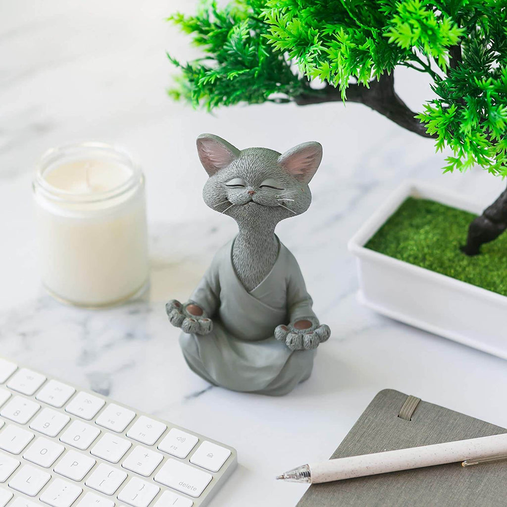 Buddha cat with a meditative expression and spiritual message