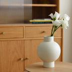 Elegant minimalist design with a smooth, curved silhouette