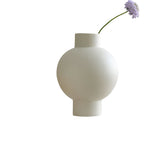 Elegant minimalist design with a smooth, curved silhouette