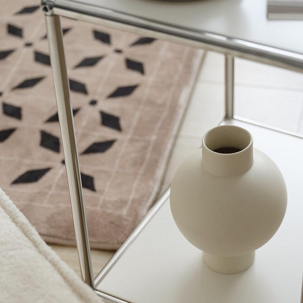 Elegant minimalist design with a smooth, curved silhouette
