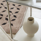 Elegant minimalist design with a smooth, curved silhouette