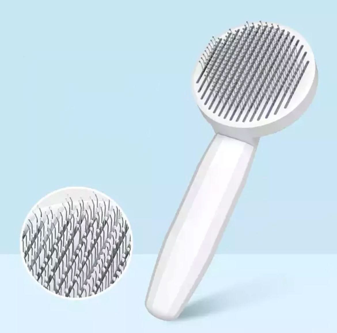 Self-cleaning cat brush for less hair loss