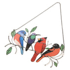 Glass window decorations in the shape of birds
