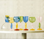 Chalice and carafe made of colored glass by Phillips