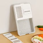 Cutting board with grater & blade change – Incl. practical hand guard