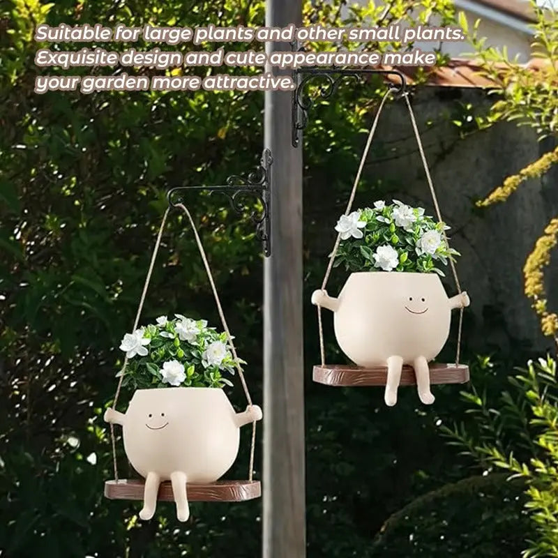 Hanging planter with smiling face