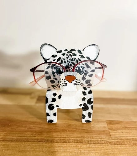 Wooden glasses stand with animals