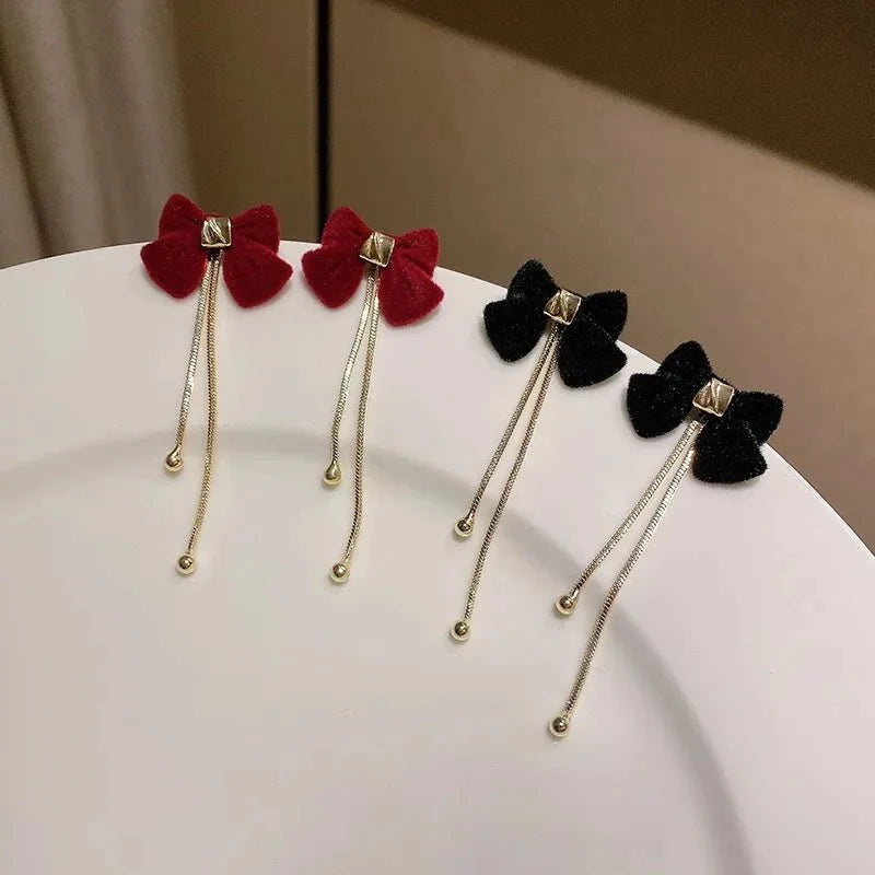 Dainty Bow Gold Dangle Earrings