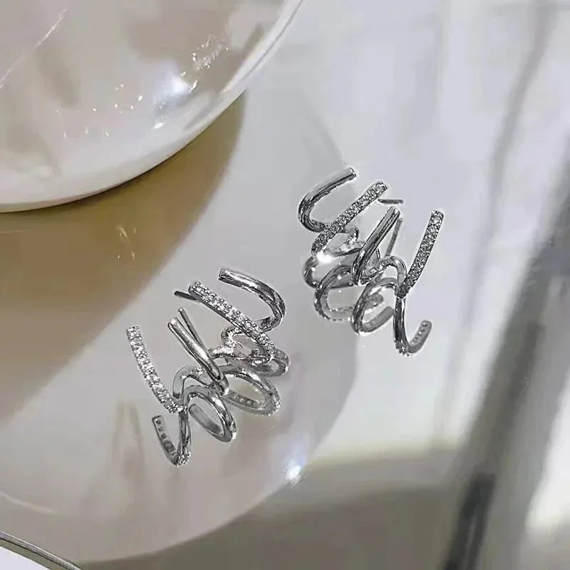 Dainty Shimmering Claw Huggie Earrings