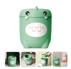 Dinosaur trash can