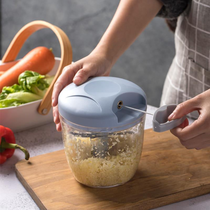 Hand vegetable chopper with a cord for quick chopping of garlic and onion