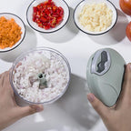 Hand vegetable chopper with a cord for quick chopping of garlic and onion
