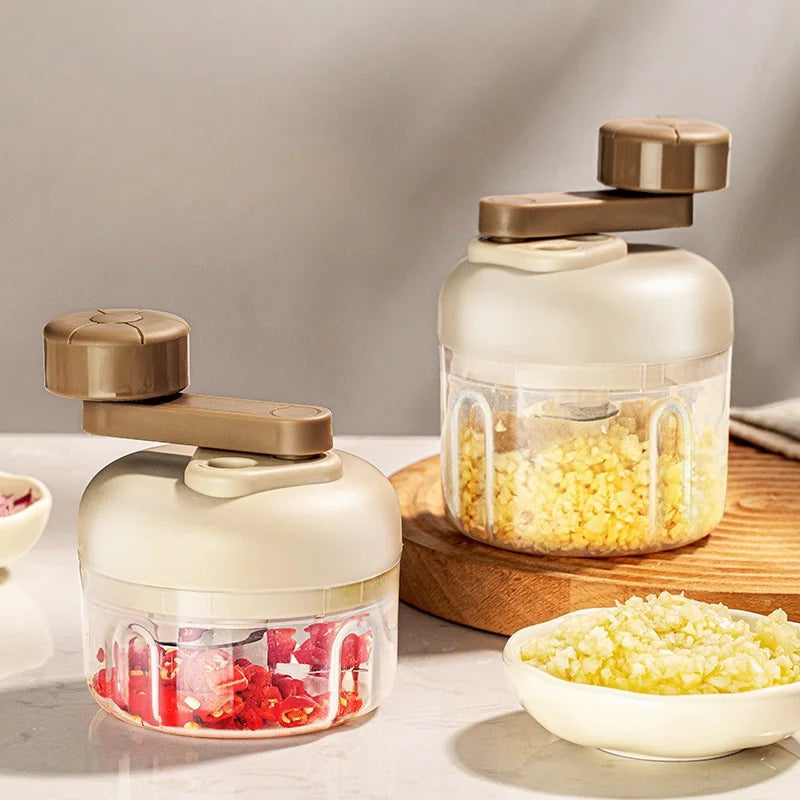 Manual food grinder with a button for quick chopping and grinding