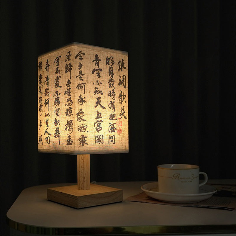 LED table lamp in a square design – wooden base with Japanese pattern