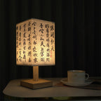 LED table lamp in a square design – wooden base with Japanese pattern