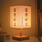 LED table lamp in a square design – wooden base with Japanese pattern