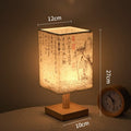 LED table lamp in a square design – wooden base with Japanese pattern