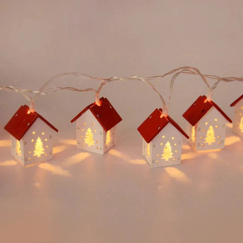 Wooden Christmas houses with LED lighting for festive decoration