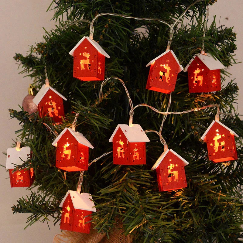 Wooden Christmas houses with LED lighting for festive decoration