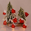 Wooden Christmas houses with LED lighting for festive decoration