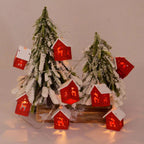 Wooden Christmas houses with LED lighting for festive decoration