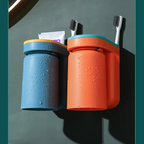Adhesive toothbrush holder