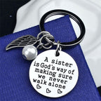 A sister is God's way of making sure we never walk alone keychain