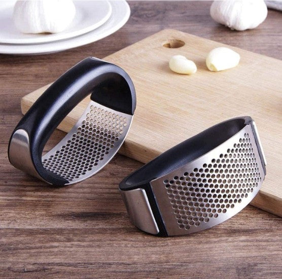 Simple manual garlic press