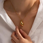 Women's Elegant Gold Teardrop Earrings | Sleek Polished Design