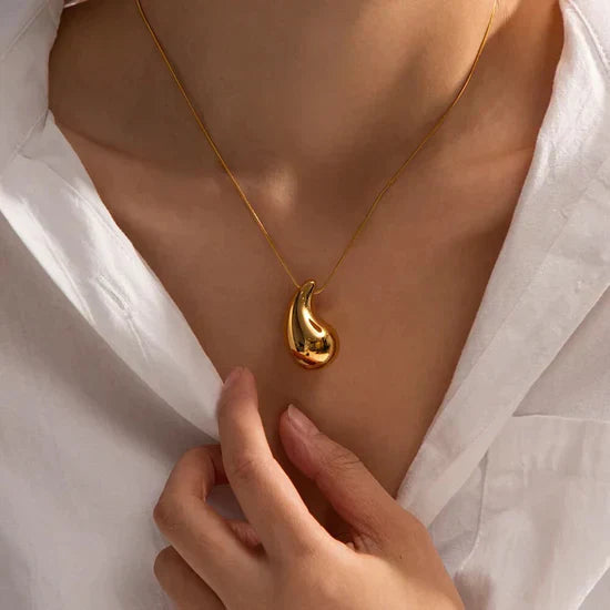 Women's Elegant Gold Teardrop Earrings | Sleek Polished Design