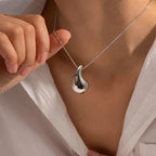 Women's Elegant Gold Teardrop Earrings | Sleek Polished Design