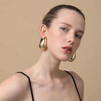 Women's Elegant Gold Teardrop Earrings | Sleek Polished Design
