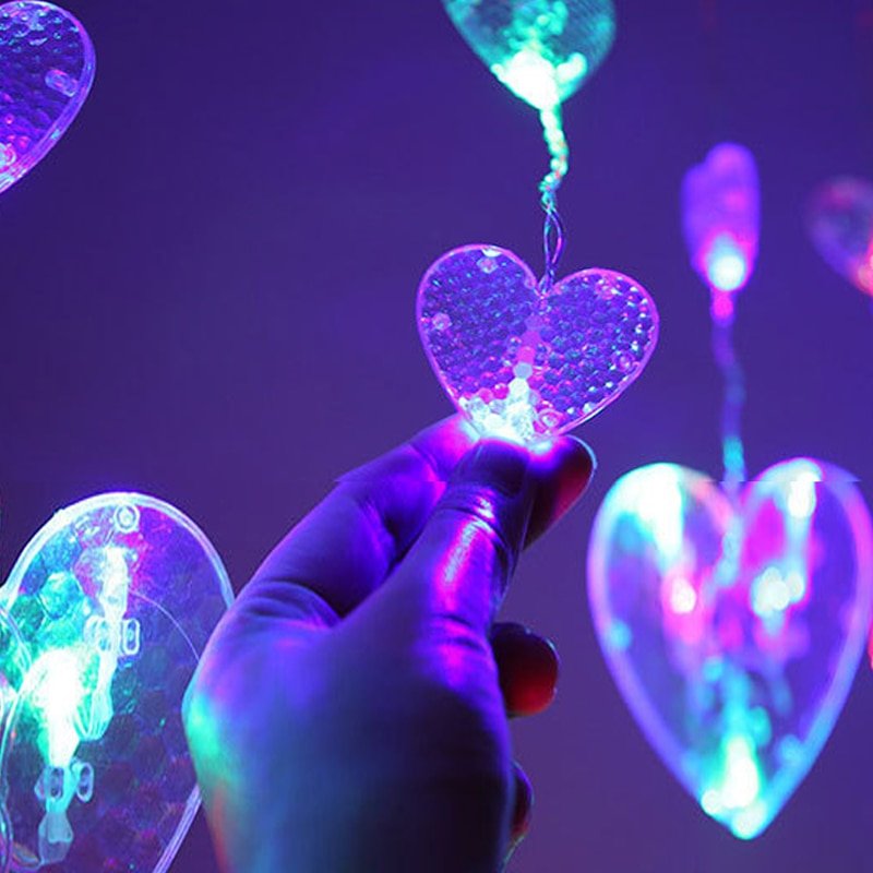 Fairy light string with heart-shaped design