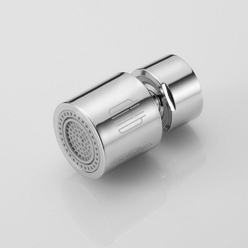 Rotatable faucet nozzle head