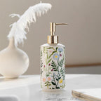 Soap dispenser made of ceramic with floral design
