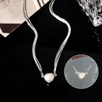 Necklace with magnetic heart pendant