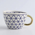 Hand‑Painted Ceramic Mug with Gold Handle