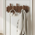 Wall cladding made of piano wood – Practical and elegant for organizing your entrance