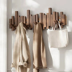 Modern piano-style hanger made of walnut and beech wood