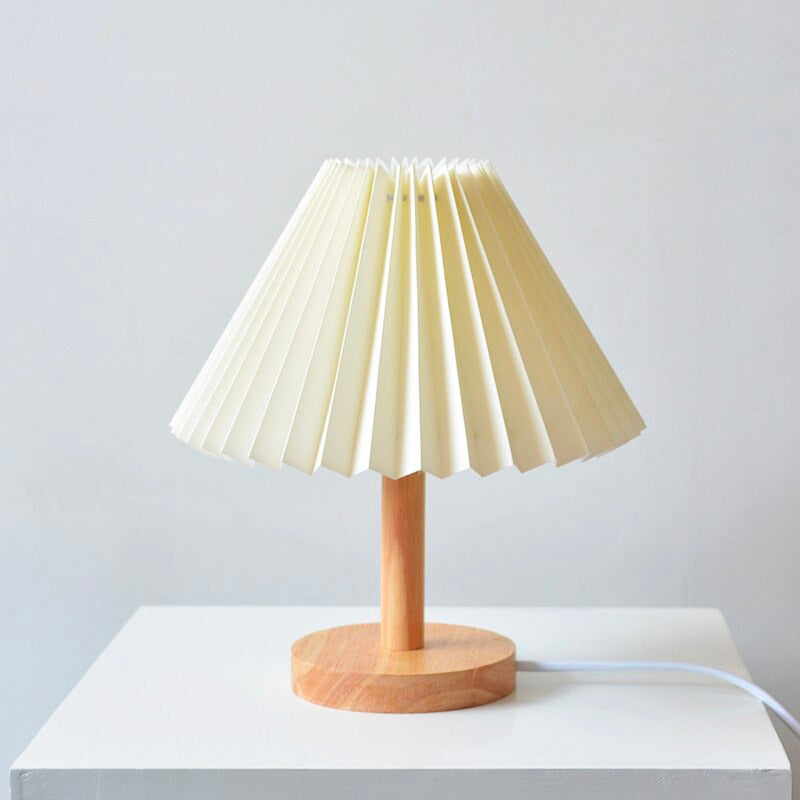 Wood bedside lamp with folded shade