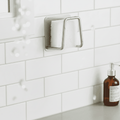Space-saving stainless steel sponge holder for sinks